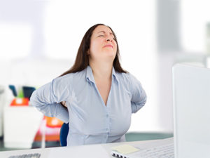 Woman-with-back-pain-at-work