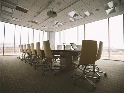 Empty executive board room - E3 Corporate Health and Wellness Programs
